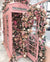 Telephone Booth with Pink Flowers